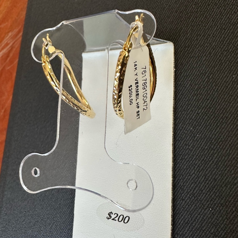 14k gold oval twist hoop earrings, never worn